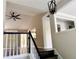 Bright living room with a built-in bookshelf, a ceiling fan, and lots of natural light at 3211 Oaktree Park Dr, Lawrenceville, GA 30044