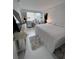 Bright bedroom featuring white walls and modern furnishings and natural light at 2479 Peachtree Rd # 503, Atlanta, GA 30305