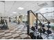 Well-equipped gym with modern equipment, machines and floor to ceiling windows at 2479 Peachtree Rd # 503, Atlanta, GA 30305