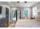 Bedroom with access to the backyard through sliding glass doors, plus view of backyard at 2580 Acorn Ne Ave, Atlanta, GA 30305