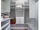 Walk-in closet with custom shelving and drawers offers ample storage space at 2580 Acorn Ne Ave, Atlanta, GA 30305