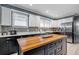 Beautiful kitchen with white and gray cabinets, stainless appliances, and a large center island at 2580 Acorn Ne Ave, Atlanta, GA 30305