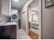 Laundry room with washer, dryer, countertop, and doorway leading to a bedroom at 2580 Acorn Ne Ave, Atlanta, GA 30305