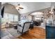 Bright living room with hardwood floors, vaulted ceilings, an archway, and an open floor plan at 2580 Acorn Ne Ave, Atlanta, GA 30305