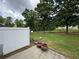 View of the spacious backyard with mature trees at 3871 Pleasant Oaks Dr, Lawrenceville, GA 30044