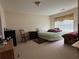 Bedroom featuring neutral carpet and a window allowing natural light at 3871 Pleasant Oaks Dr, Lawrenceville, GA 30044
