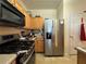 Kitchen features stainless steel refrigerator and appliances at 3871 Pleasant Oaks Dr, Lawrenceville, GA 30044