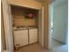 Laundry room featuring washer and dryer with folding area at 3871 Pleasant Oaks Dr, Lawrenceville, GA 30044