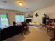 Cozy living room featuring fireplace, sliding glass doors, and carpet at 3871 Pleasant Oaks Dr, Lawrenceville, GA 30044