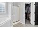 Main bathroom featuring a shower and walk-in closet at 400 Kyle Ct, Fayetteville, GA 30215