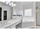 Main bathroom featuring a soaking tub, shower, and dual sinks at 400 Kyle Ct, Fayetteville, GA 30215