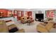 Spacious basement featuring a cozy seating area, wet bar, and vibrant decor, perfect for entertaining and relaxation at 681 Hampton Sw Pl, Marietta, GA 30064