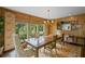 Elegant dining room with large windows and chandelier lighting at 681 Hampton Sw Pl, Marietta, GA 30064