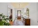 Charming foyer with hardwood floors, a vintage dresser, and a decorative front door, creating an inviting first impression at 681 Hampton Sw Pl, Marietta, GA 30064