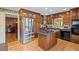 Modern kitchen with stainless steel refrigerator and ample cabinet space at 681 Hampton Sw Pl, Marietta, GA 30064