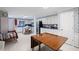 Spacious kitchen and dining area featuring white cabinets, vintage blue countertops, and ample natural light at 681 Hampton Sw Pl, Marietta, GA 30064