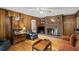 Inviting living room features wood paneling, brick fireplace, and comfortable seating at 681 Hampton Sw Pl, Marietta, GA 30064