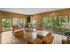 Bright sunroom with large windows and sliding glass doors to outdoor deck at 681 Hampton Sw Pl, Marietta, GA 30064