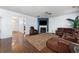 Comfortable living space with a fireplace, cozy seating, and plenty of natural light at 1612 Nations Trl, Riverdale, GA 30296