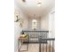 Upstairs hallway with a decorative table, pendant light, and stylish artwork at 190 Country Club Dr, Hiram, GA 30141