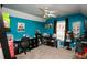 Craft room with sewing machines, desk, storage shelves and window with natural light at 190 Country Club Dr, Hiram, GA 30141