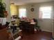 Kitchen with wooden floors, windows, table, and chairs at 3683 Miller St, Lithia Springs, GA 30122