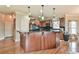 The kitchen features granite countertops, stainless steel appliances, and a functional island at 2727 Lost Mill Trce, Buford, GA 30519
