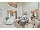 Open-concept living room showcasing high ceilings and seamless flow to other living spaces in the home at 2727 Lost Mill Trce, Buford, GA 30519