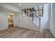 Basement view showing vinyl floors, recessed lights, stairs to another level, and an adjacent bathroom at 3880 Northpoint Dr, Marietta, GA 30062