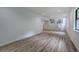 Spacious basement with vinyl floors, recessed lighting, staircase, and doorway to an adjacent bathroom at 3880 Northpoint Dr, Marietta, GA 30062