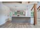 Open kitchen with grey center island, modern appliances and fixtures at 3880 Northpoint Dr, Marietta, GA 30062