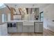 Kitchen island with built in microwave, modern appliances and fixtures at 3880 Northpoint Dr, Marietta, GA 30062