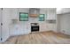 Modern kitchen with white cabinets, stainless steel appliances, and wooden accents at 3880 Northpoint Dr, Marietta, GA 30062