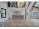 Spacious living room with vaulted ceilings, modern kitchen and hardwood floors at 3880 Northpoint Dr, Marietta, GA 30062