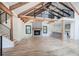 Bright living room with vaulted ceilings, a stone fireplace, and an open floor plan at 3880 Northpoint Dr, Marietta, GA 30062