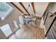 Bright living room with hardwood floors, modern lighting, cathedral ceilings and beautiful staircase at 3880 Northpoint Dr, Marietta, GA 30062