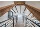The upper-level hall features modern railings and overlooks the interior of the home at 3880 Northpoint Dr, Marietta, GA 30062