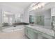 Bathroom includes a soaking tub with vanities and a glass-enclosed shower at 4656 Ivygate Se Cir, Atlanta, GA 30339