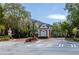Elegant gated entrance to a residential community with manicured landscaping and classic architecture at 4656 Ivygate Se Cir, Atlanta, GA 30339