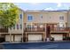 The exterior of the home features multiple rear decks and two car garages at 4656 Ivygate Se Cir, Atlanta, GA 30339