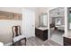 Nicely tiled bathroom vanity with adjacent entry into bedroom at 5531 Hurstcliffe Nw Dr, Kennesaw, GA 30152