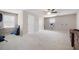 Spacious bonus room with a ceiling fan, neutral colors, and two closets at 5531 Hurstcliffe Nw Dr, Kennesaw, GA 30152