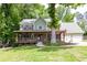 Charming two-story home with a welcoming front porch and well-manicured lawn at 5531 Hurstcliffe Nw Dr, Kennesaw, GA 30152