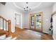 Elegant foyer with hardwood floors and natural light at 5531 Hurstcliffe Nw Dr, Kennesaw, GA 30152