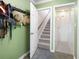 Hallway featuring a coat rack, storage, and door to shower stall at 5531 Hurstcliffe Nw Dr, Kennesaw, GA 30152
