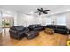 Bright living room with hardwood floors and comfortable seating arrangement at 5531 Hurstcliffe Nw Dr, Kennesaw, GA 30152