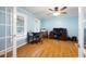 Bright home office featuring hardwood floors and ample workspace at 5531 Hurstcliffe Nw Dr, Kennesaw, GA 30152