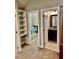 This image shows access to a walk-in closet and a bathroom at 3397 Holly Glen Dr, Dacula, GA 30019