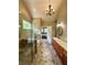 Bathroom with separate vanities, granite countertops, and a glass door shower overlooking the tub at 3397 Holly Glen Dr, Dacula, GA 30019