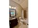 This bathroom includes a single sink vanity, dark hardware, and a shower-tub combo at 3397 Holly Glen Dr, Dacula, GA 30019